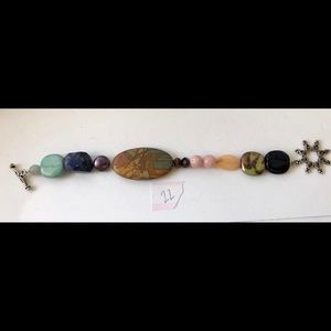 Segmented bead bracelet- brown pink orange blue 22